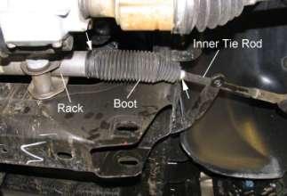 4) Remove the lower coil-over nut and bolt. See illustration 8. Lower jack and remove the coil-over assembly. Illus. 5 7) Remove the steering knuckle. Hang the half shaft with wire or a tie wrap.