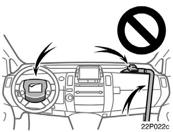 22p022c Do not put anything or any part of your body on or in front of the dashboard or steering wheel pad that houses the front airbag system.