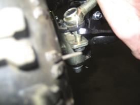 ATTACHING TIE ROD END (STEERING ARM) Locate the tie rod end and remove the bolt, Slide into