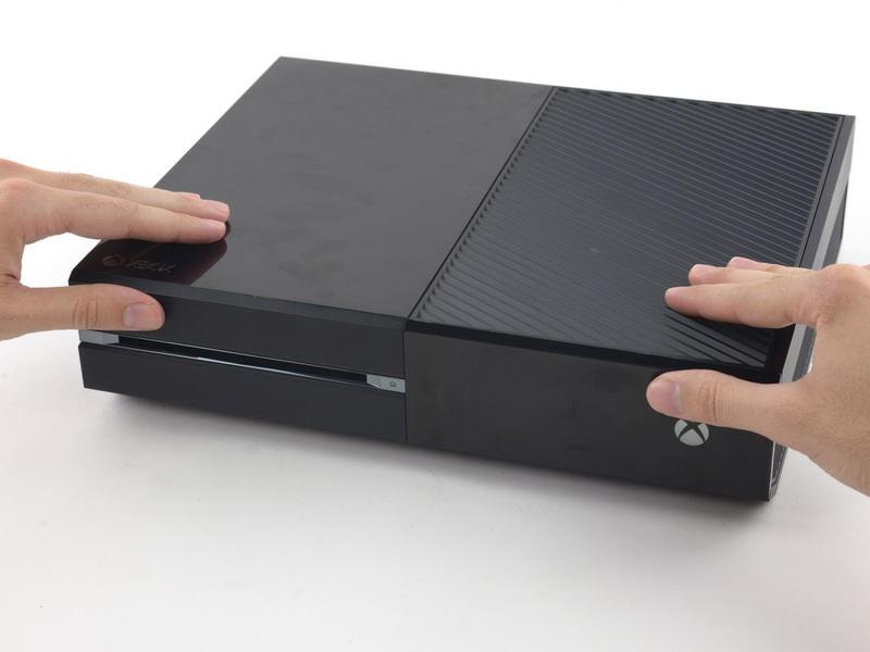 case. Push the top of the front panel into the Xbox, like closing a mailbox.