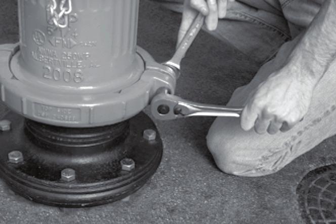 Assemble the Standpipe Traffic Coupling, observing the Top Side markings on the coupling halves.