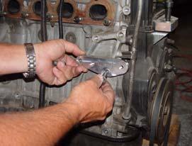 transmission. 3. Install the cable to hydraulic adapter assembly on the transmission. 4.