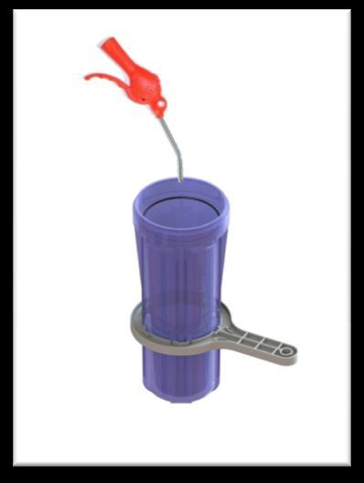 Use the filter wrench to remove the filter canister, turning the