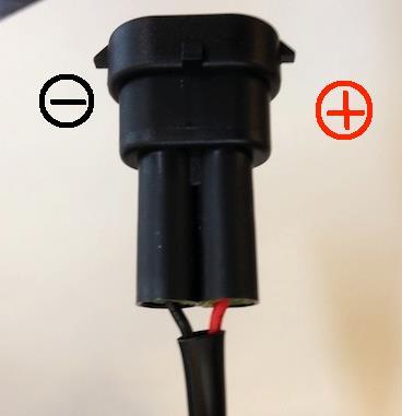 The LED fog lamp housing wires are not inserted into the supplied connectors. Push the negative wire (black or black-white) into the connector.