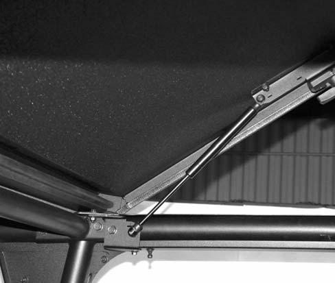 13 of 22 STEP 15: (REAR CANOPY) 15.1 Per figure 15.1, loosen the (2) 1/4-20 bolts for each hinge on the front of the rear canopy.