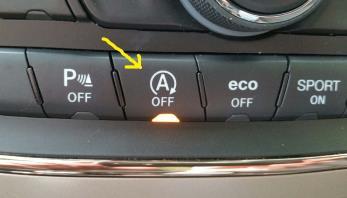 23. If you want if you want the Engine Stop Start to default to OFF, start the engine and press the Automatic Engine Stop Start Disable button on the lower console, as shown in the photo on the right.