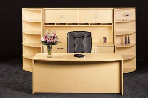 Shown with asymmetrical bridge, lateral file credenza, overhead storage unit with doors and paper storage compartments and 14 -high tack board.