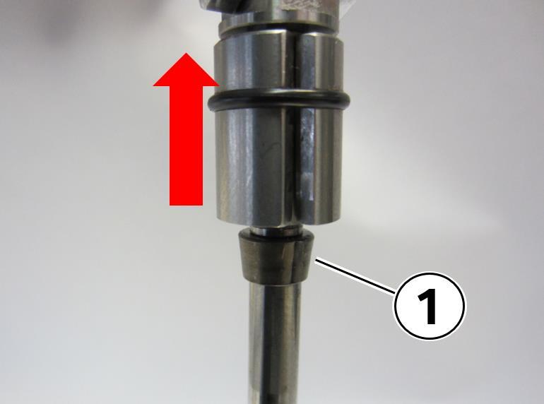 76. Lift the tool gently strait upward in the direction of the red arrow and the keepers (1) will be left behind on the valve stem. 77.