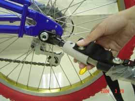 release the nut of bike rear wheel Take the silver alloy tubing (Part B) that fixed at the