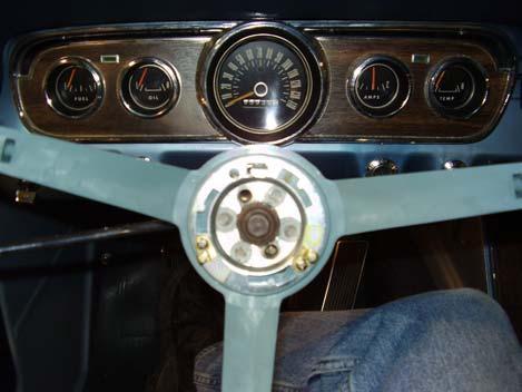 1965-Early 1967 Manual Mustang Install Manual 1. Remove center horn pad from steering wheel. 2.