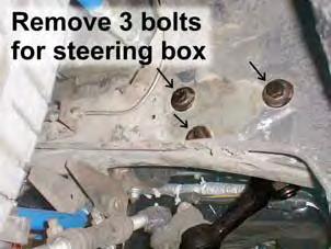 2) STEERING BOX REMOVAL Raise vehicle using lift or jack and secure with jack stands. Remove center link from pitman arm. A balljoint fork or similar tool may be required.