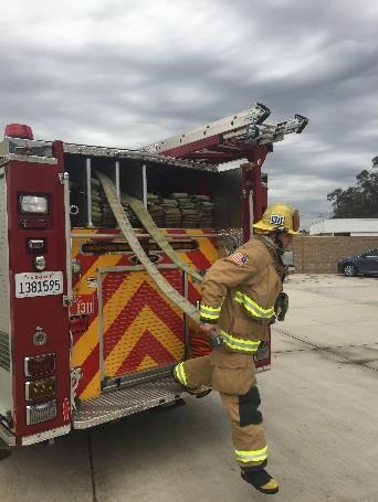 Once the caps are off, the firefighter must look for and clear any debris that may be inside the connection.