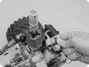 To remove the excess fuel from the engine follow the procedures listed below: Completely close the high speed needle valve (turn it clockwise gently) until it bottoms out.