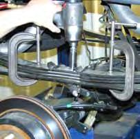 12. Attach & tighten a C-clamp on each end of the rear leaf spring to hold the rear leaf spring assembly securely together.