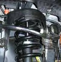 11. Disconnect the front sway bar from the frame. Disconnect the sway bar links from the lower A-arm & remove the sway bar. 12.