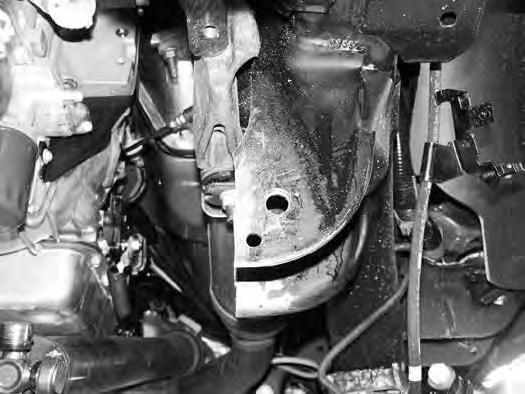 Figure 15 26. Install the new driver s side differential bracket to the original mount with the factory bolts Figure 16.