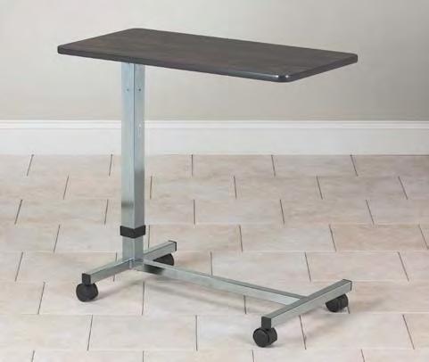 OVER-BED TABLES Length Width TS-160 top 15" 31 1 /2" base 16" 26 1 /2" height range 31" 41 1 /2" U-Base, Over Bed Table Walnut laminate top Chrome plated base U-base for easy access