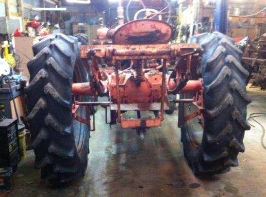 Back before Allis Chalmers was marketing true high crop tractors, Thompson of Louisiana made kits with larger rear wheels and front axles with taller spindles.