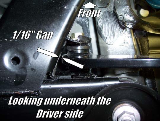 Tip: Use a floor jack to elevate the suspension in order to line up the camber link end with the spindle clevis.