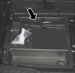 WHAT TO DO IN EMERGENCIES Jack Location The spare tire jack is located in the rear cargo area