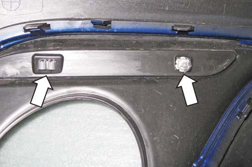 18. Remove the two (2) rear reflectors by