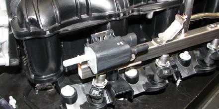 Install the factory EVAP hose to the rear barb of the EVAP solenoid.