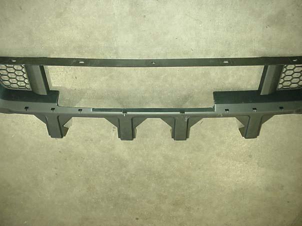 1 3/4 1 15 3/8 4 5/8 Figure 6 Bumper grille trim dimensions 7. Trim the bumper grille as shown in Figure 6. It should be trimmed to the back edge of the bumper or 1-3/4.