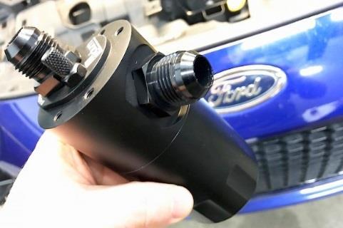 Use lubrication on the - 10AN fitting O-rings and install to the catch can ports.