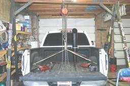 To install the ½ suction tube it is necessary to either drop the fuel tank or to lift the truck bed.