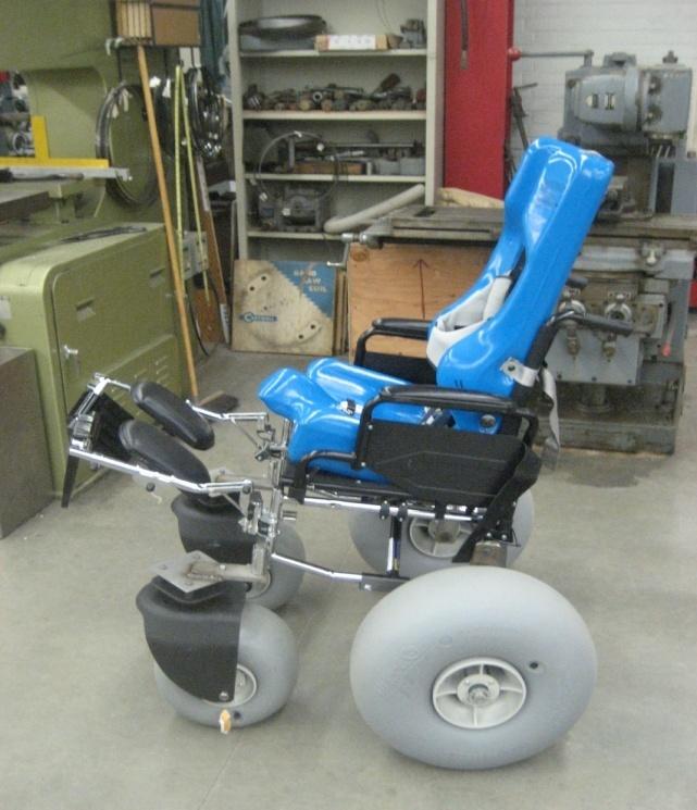 Page 24 Figure 24: Wheelchair with seat. Sean s knees and feet still had to be stabilized, while the Carrie Seat s seatbelt stabilized his hips.