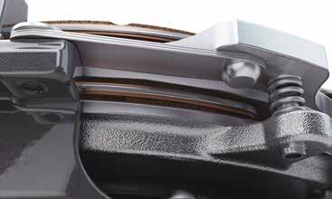 wear tab indicators for improved visibility The new strap drive on the intermediate plate eliminates lug failures and open cutch rattle.