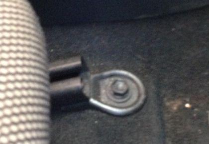 Unplug the connector by pressing down on the little tab and pulling the white part at the same time: Remove the seat from the car and put it in a