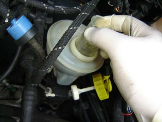 master cylinder filter. Pulling out the 10. Fill the master cylinder up with clean DOT 4 fluid.