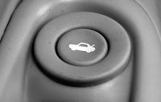 Trunk CAUTION: It can be dangerous to drive with the trunk lid open because carbon monoxide (CO) gas can come into your vehicle. You can t see or smell CO. It can cause unconsciousness and even death.