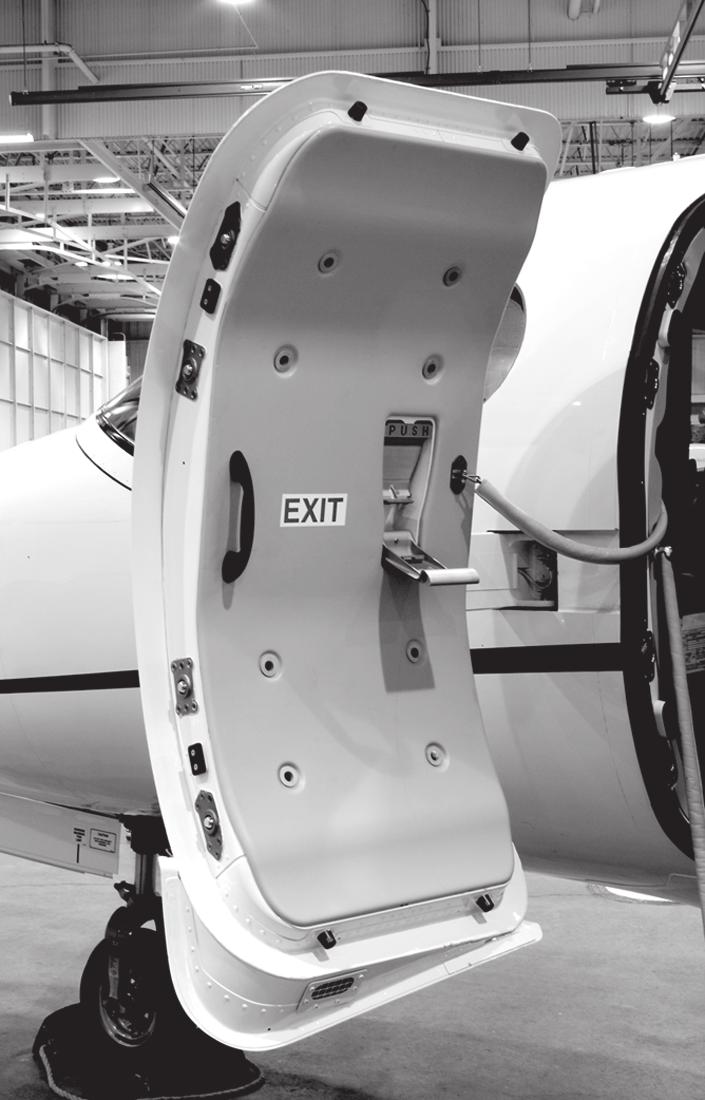 CITATION MUSTANG OPERATING MANUAL ENTRANCE DOOR The cabin entrance door is on the forward left side of the fuselage (Figure 1-5). The entrance door opens outboard and forward.