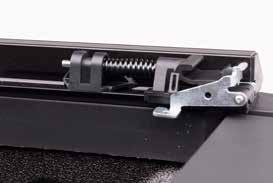 latches are easily accessed at both sides of the truck, securely fastening the