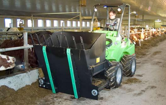 Farming Silage dispenser This dispenser bucket is equipped with hydraulically driven elevator in the bottom and discharging to both right and left side.