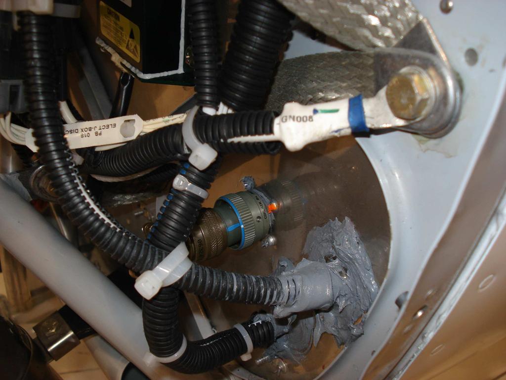 Figure 10 Location of firewall feed through. L. O2 bottle relocation (T182T only) WARNING: Do not let oil, grease, or other lubricants near high pressure oxygen because it can cause a fire.