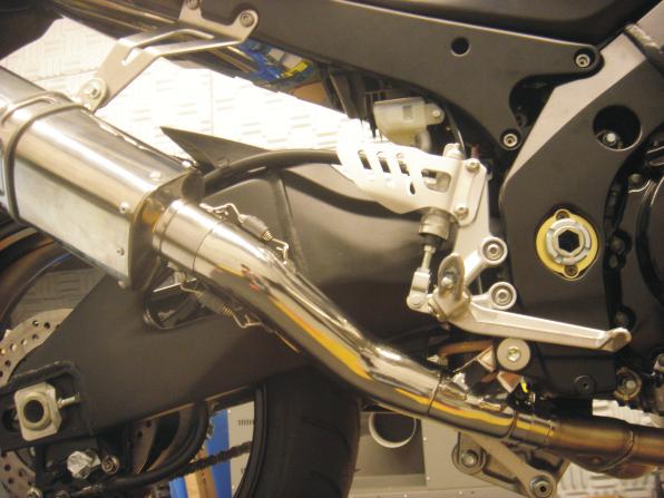 Installation Procedures: Page 2 Caution: Exhaust system can be extremely hot. Let motorcycle cool down before beginning installation. Note: Read through all instructions before beginning installation.