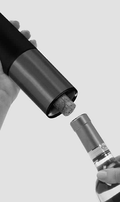 3 Lift the Electric Wine Opener away from the bottle. To remove the cork simply depress the upper part of the switch. The spiral will turn in a counterclockwise direction and release the cork.