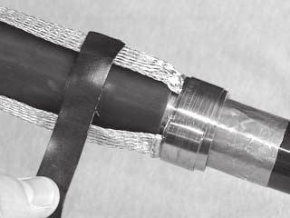 2 For Tape Shield Cable: Make the ground braid connection to the cable shield by wrapping a constant force