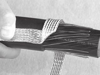 4.3.5 For Tape Shield Cable: vinyl tape Form the shield sleeve across the splice body.
