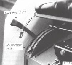 CONTROLS AND INSTRUMENTS H.S.T.RANGE SELECTOR LEVER The range selector lever, on the left side of the seat can be shifted when the H S T foot pedal is in the Neutral position and High range ( H ),