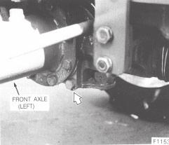 If low, add new oil of the type specified, page 33, through the combined dipstick/ filler plug. Do not fill beyond the mark on the stick, as the front axle and differential housing will be overfilled.
