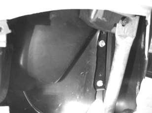 The pilot hole MUST continue deep enough to penetrate the metal plate attached to trim panel AND through the galvanized bracket approximately 1½ below trim panel.