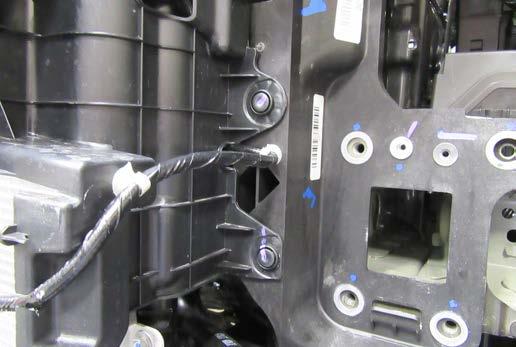 Remove the plastic shielding from the vehicle by removing the