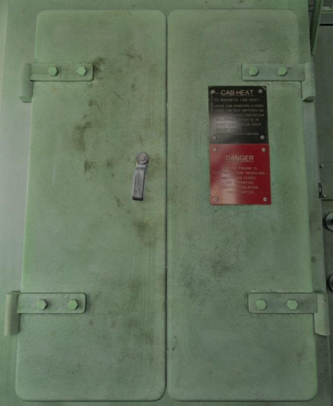 Auxiliary cupboard On the back wall of the non-driver s side of the cab. Opened and closed by clicking it.