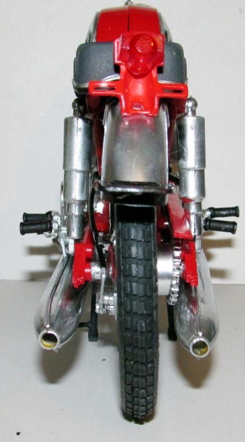 Assemble the tank halves to the bike. Run a tube from the rear brake to the brake pedal.