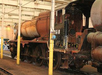 48518, provider of the boiler, stored in former E.W.S. wagon repair shed at Barry, June 2007.