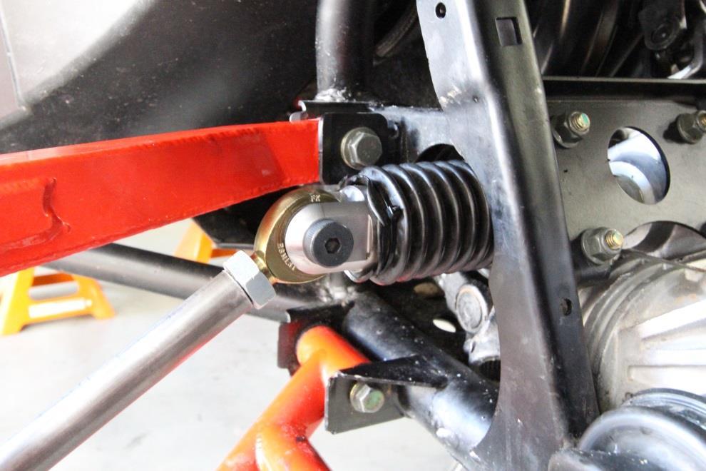 Figure 4: inner rod end attached to clevis, and dust boot tied to clevis groove. Figure 5: Drill the tie rod hole in the spindle, out to ½ 9.